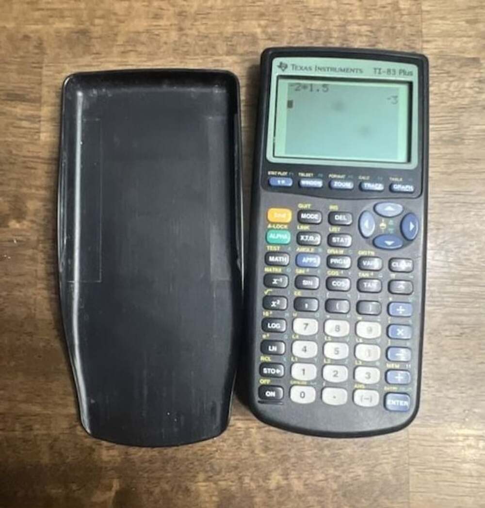 Texas Instruments TI-83 Plus Graphing Calculator With Slide Cover